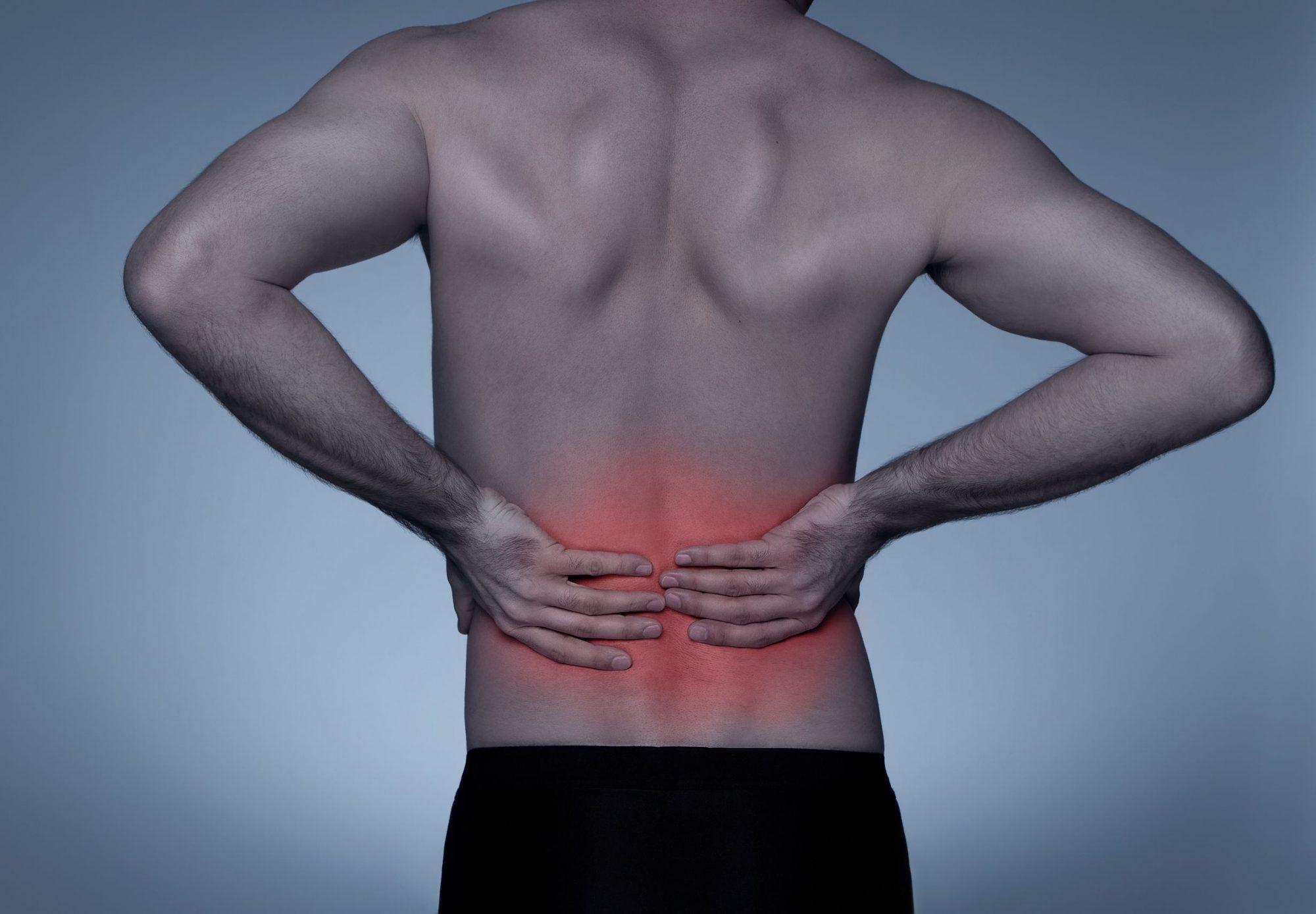 Patient discussing back pain with an orthopedic provider