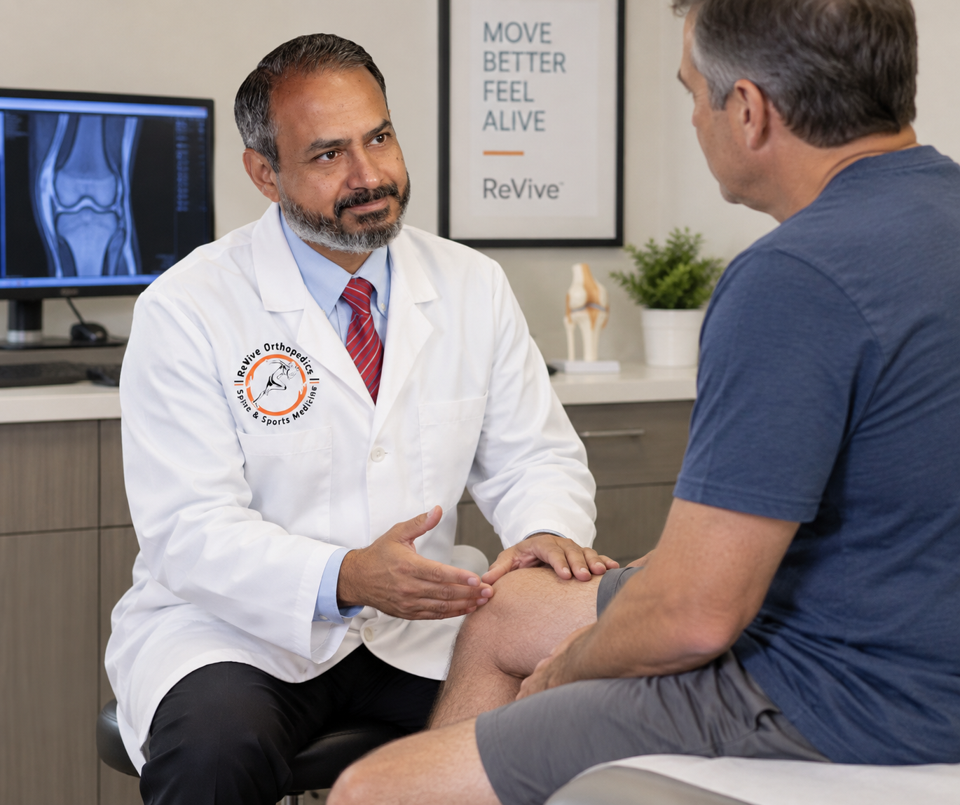 Dr. Praveer Srivastava discussing knee pain and regenerative treatment options with a patient at ReVive Orthopedics